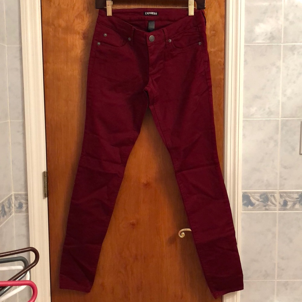 Express burgundy red skinny jeans